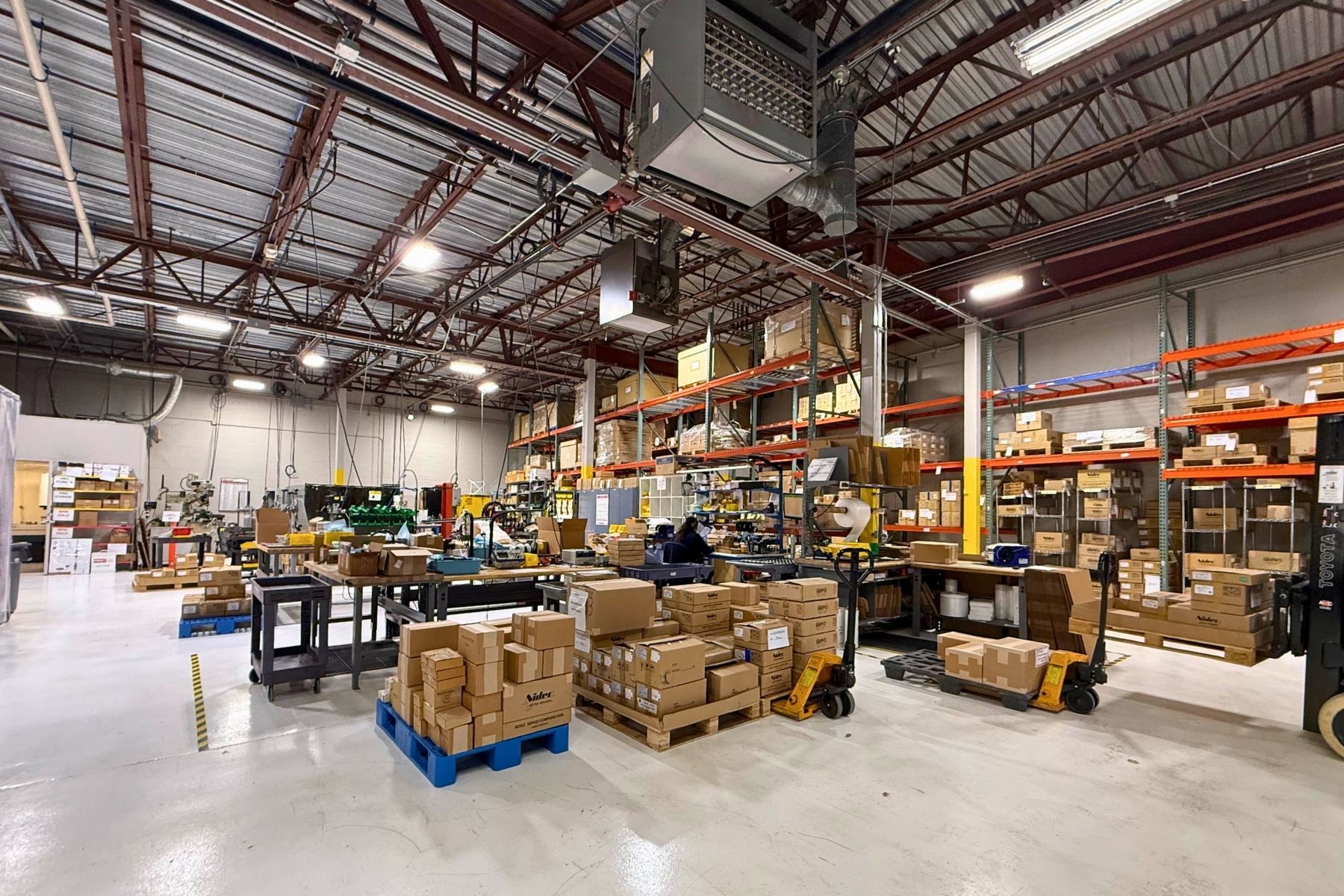 Suite 100 Features A High-Bay Warehouse With 16' 3” Clear Heights, Ideal For Logistics and Light Manufacturing. Suite 100 Features A High-Bay Warehouse With 16' 3” Clear Heights, Ideal For Logistics and Light Manufacturing.