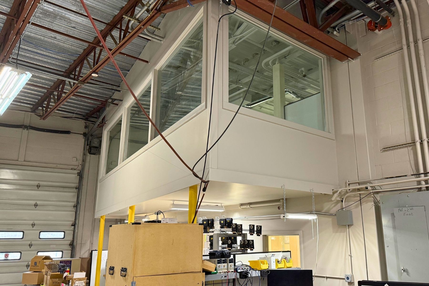 Suite 100 - Functional 704 SF Mezzanine Overlooking the Warehouse Floor, Providing Integrated Office and Oversight Suite 100 - Functional 704 SF Mezzanine Overlooking the Warehouse Floor, Providing Integrated Office and Oversight