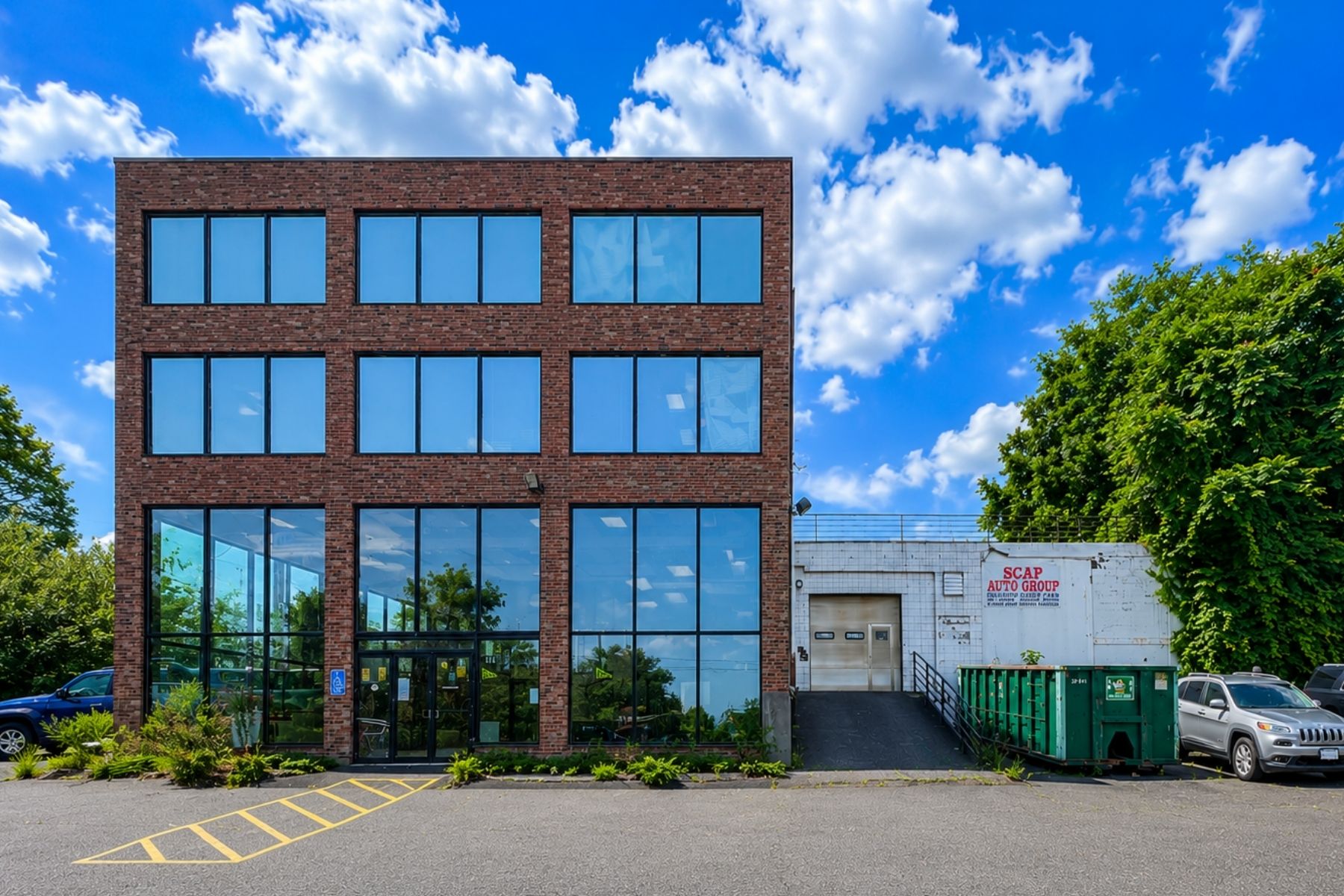 Fully Handicap Accessible Side Entrance for Optimal Convenience and Compliance Handicap accessible side entrance with a ramp at the commercial building.