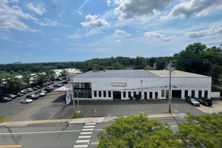 Three Parcels Totaling 1.37 Acres with a 21,921 SF Industrial Building Three Parcels Totaling 1.37 Acres with a 21,921 SF Industrial Building