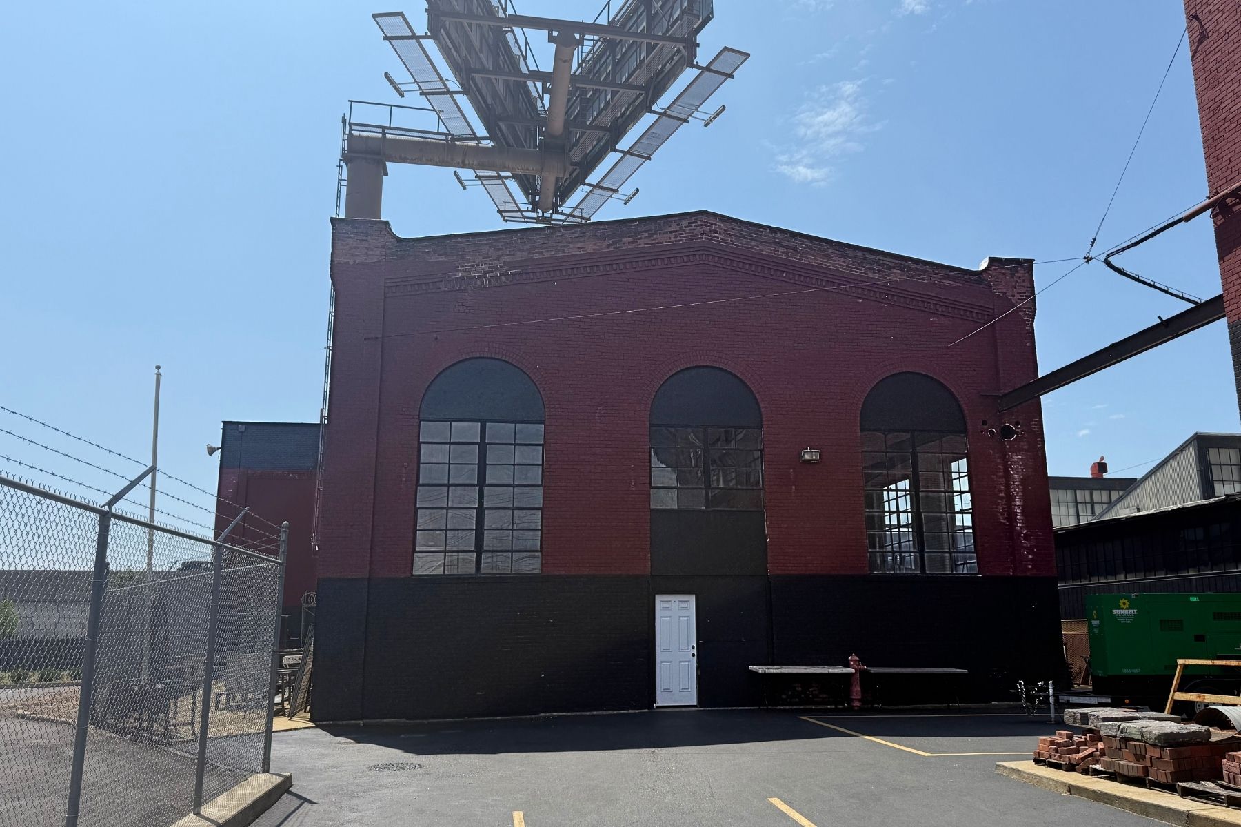 Adjacent One-Story 5,253 SF Building Features a 23' High Cathedral Ceiling Adjacent One-Story 5,253 SF Building Features a 23' High Cathedral Ceiling