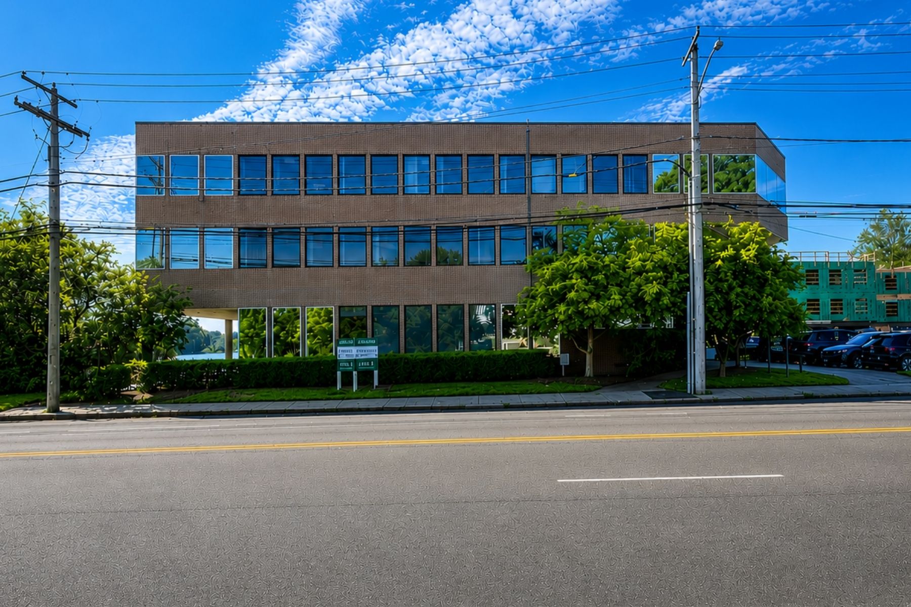 Prominent Visibility in a High-Traffic Commercial Corridor Exterior street view of the One Post Road commercial office building in Fairfield, CT, highlighting its prominent visibility along a high-traffic corridor.