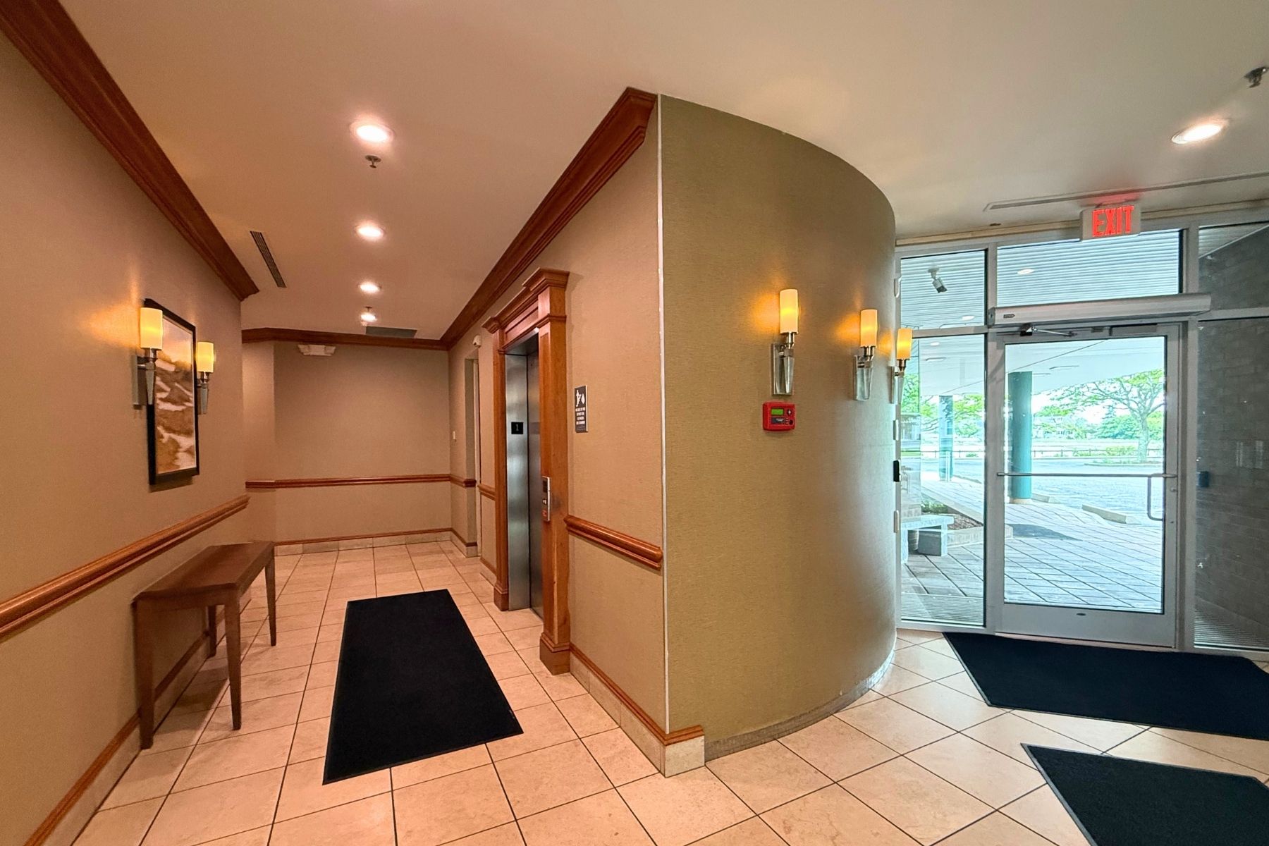 Elegant Common Area With Marble Floors and Automatic ADA-Compliant Entrance Door Elegant Common Area With Marble Floors and Automatic ADA-Compliant Entrance Door