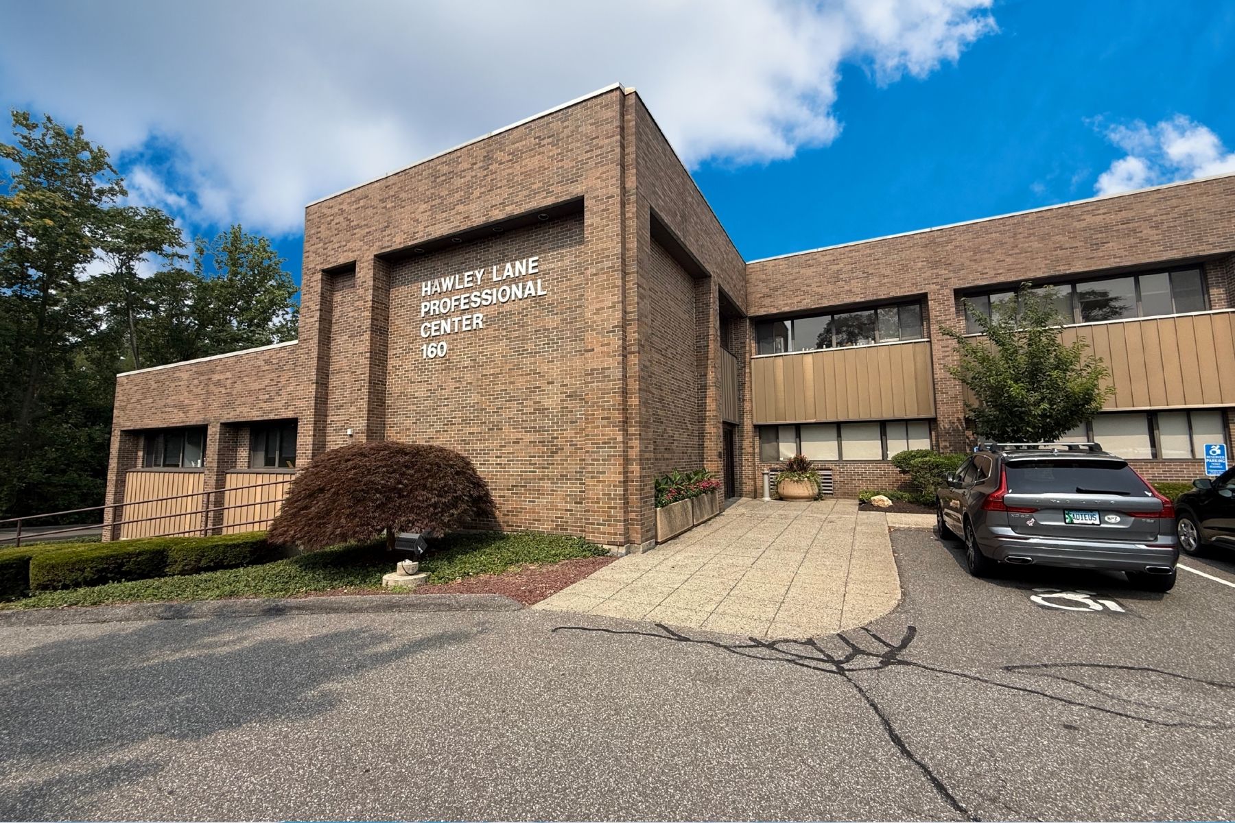 Three Condominiums Available in the Hawley Lane Professional Center is a 23,200 SF Building