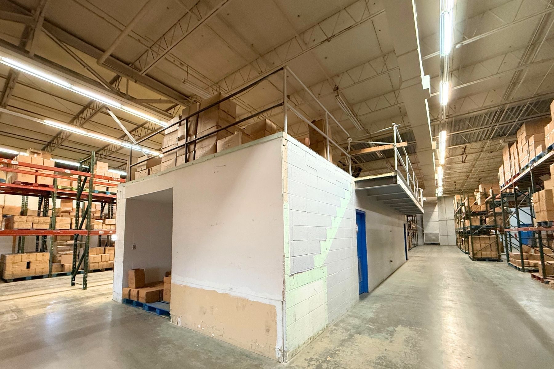 Mezzanine Above Two Restrooms & Storage bay Mezzanine Above Two Restrooms & Storage bay