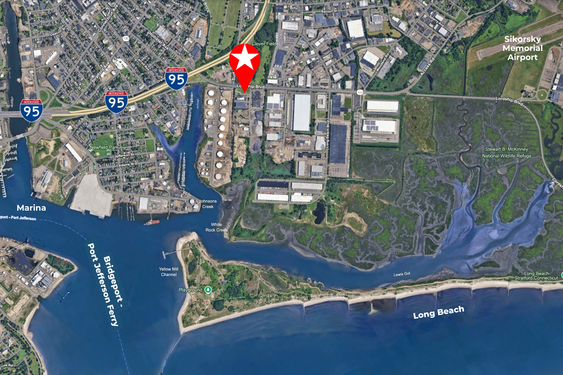 Strategic Stratford Location. Centrally Located Near Key Hubs Aerial view of Stratford with a red star marking the 225 Lordship Boulevard project site