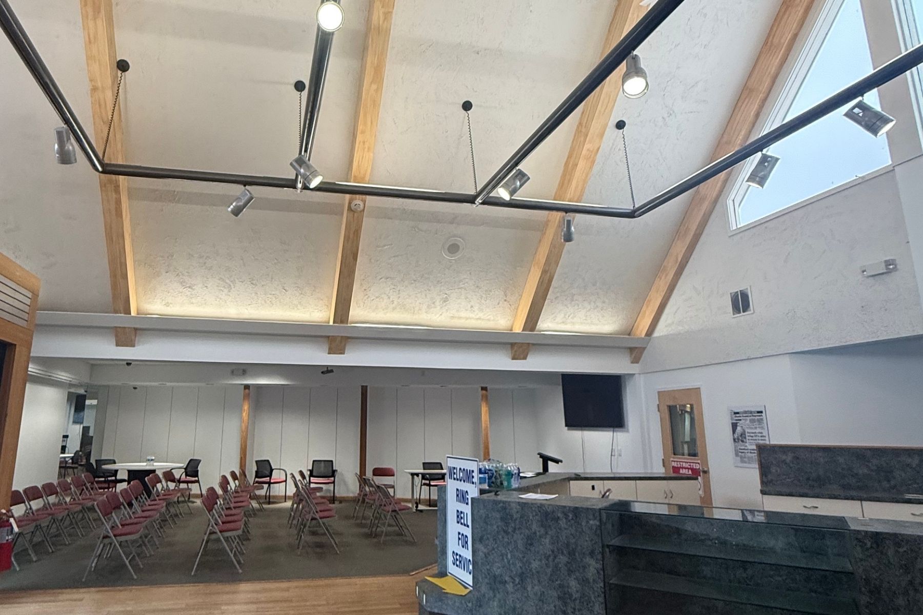 Architectural Timber Framing and Soaring Vaulted Ceilings Provide a Premium Modern Aesthetic for a Flagship Location Architectural Timber Framing and Soaring Vaulted Ceilings Provide a Premium Modern Aesthetic for a Flagship Location