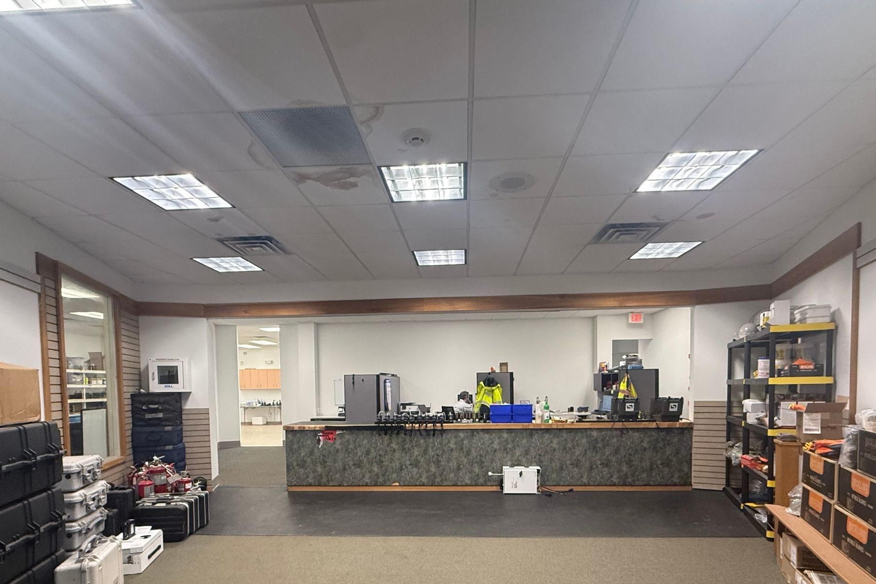 Versatile Retail Showroom Featuring Built-In Service Counter and Flexible Wall Space for Custom Merchandise Displays Versatile Retail Showroom Featuring Built-In Service Counter and Flexible Wall Space for Custom Merchandise Displays