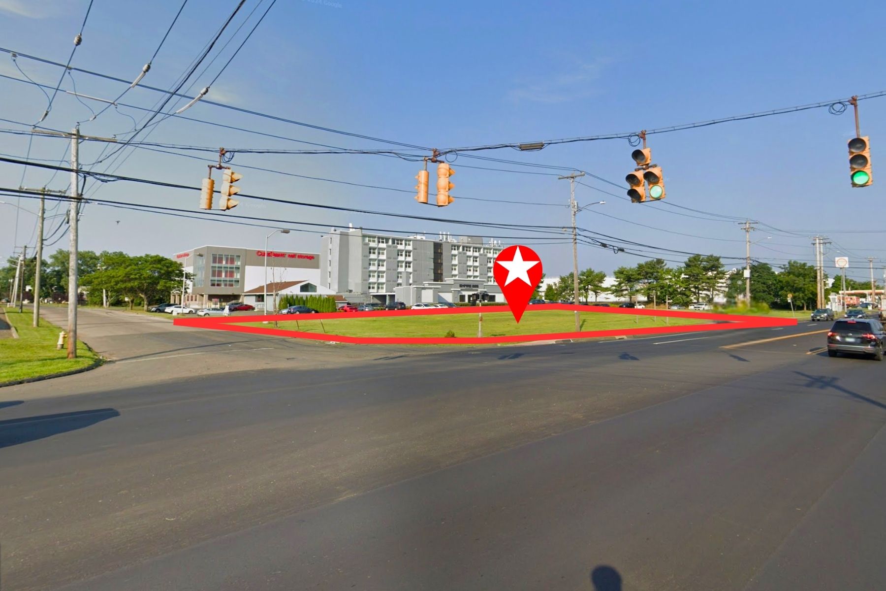 Prime Corner Visibility At High-Traffic Signalized Intersection Street-level view of 225 Lordship Boulevard at a signalized intersection in Stratford, CT