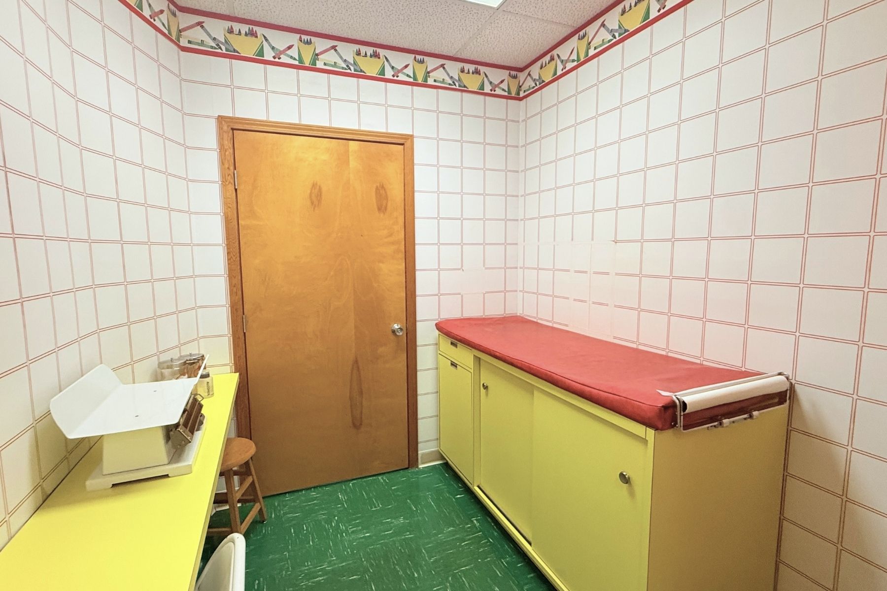 Office or Exam Room Bright Medical Office Lab Workstation Featuring Yellow Laminate Countertops, and Built-In Storage Cabinets At Hawley Lane Professional Center In Trumbull, CT