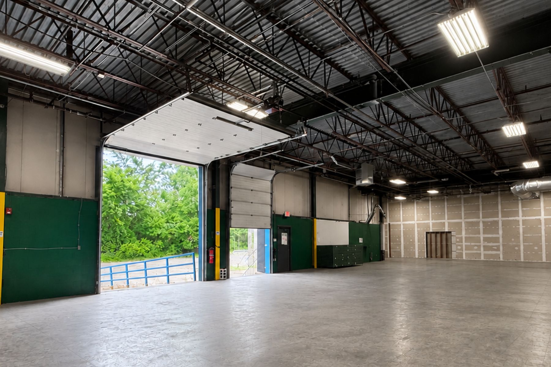 High Ceilings: 5,100 SF Featuring a 16' 7" Ceiling Height to Steel 5,100 SF Open Warehouse Space Featuring 16-Foot Ceilings and Flexible Industrial Zoning