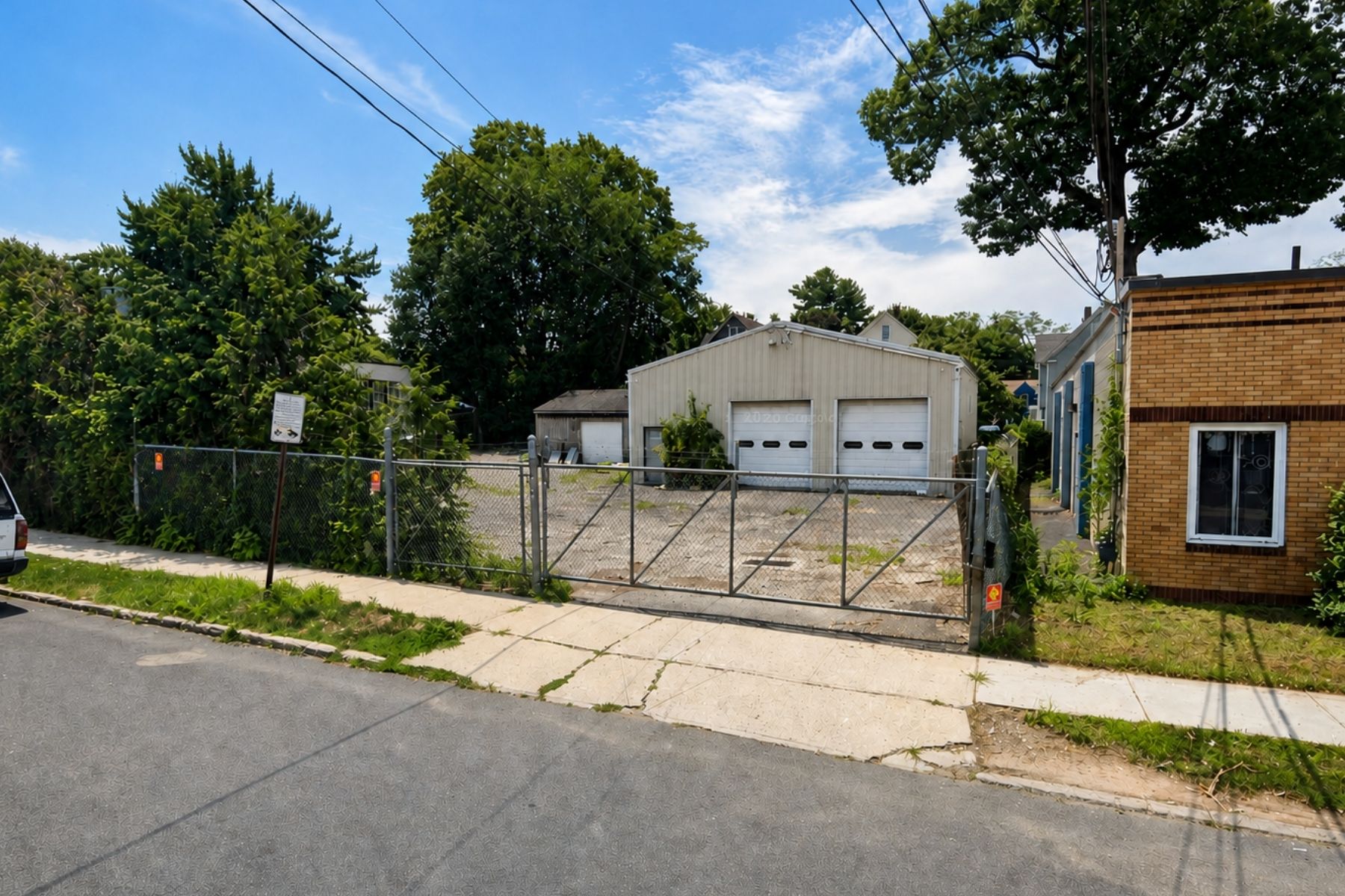 Fully Fenced Contractor Yard Entrance at 213-223 Bennett Street in Bridgeport CT Fully Fenced Contractor Yard Entrance at 213-223 Bennett Street in Bridgeport CT