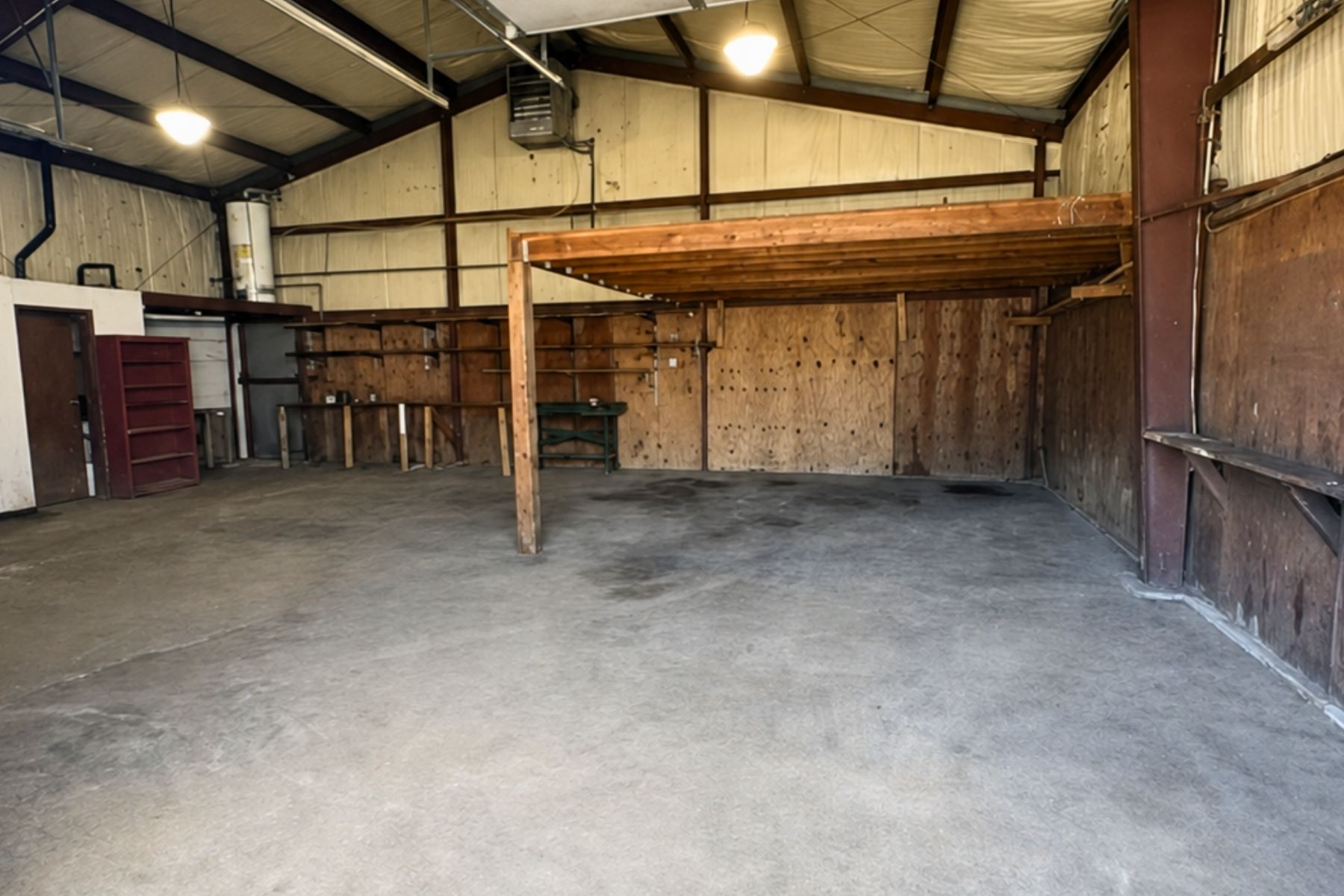 1,200 SF Garage Interior Featuring 12-Foot Ceilings and Ample Storage Space 1,200 SF Garage Interior Featuring 12-Foot Ceilings and Ample Storage Space