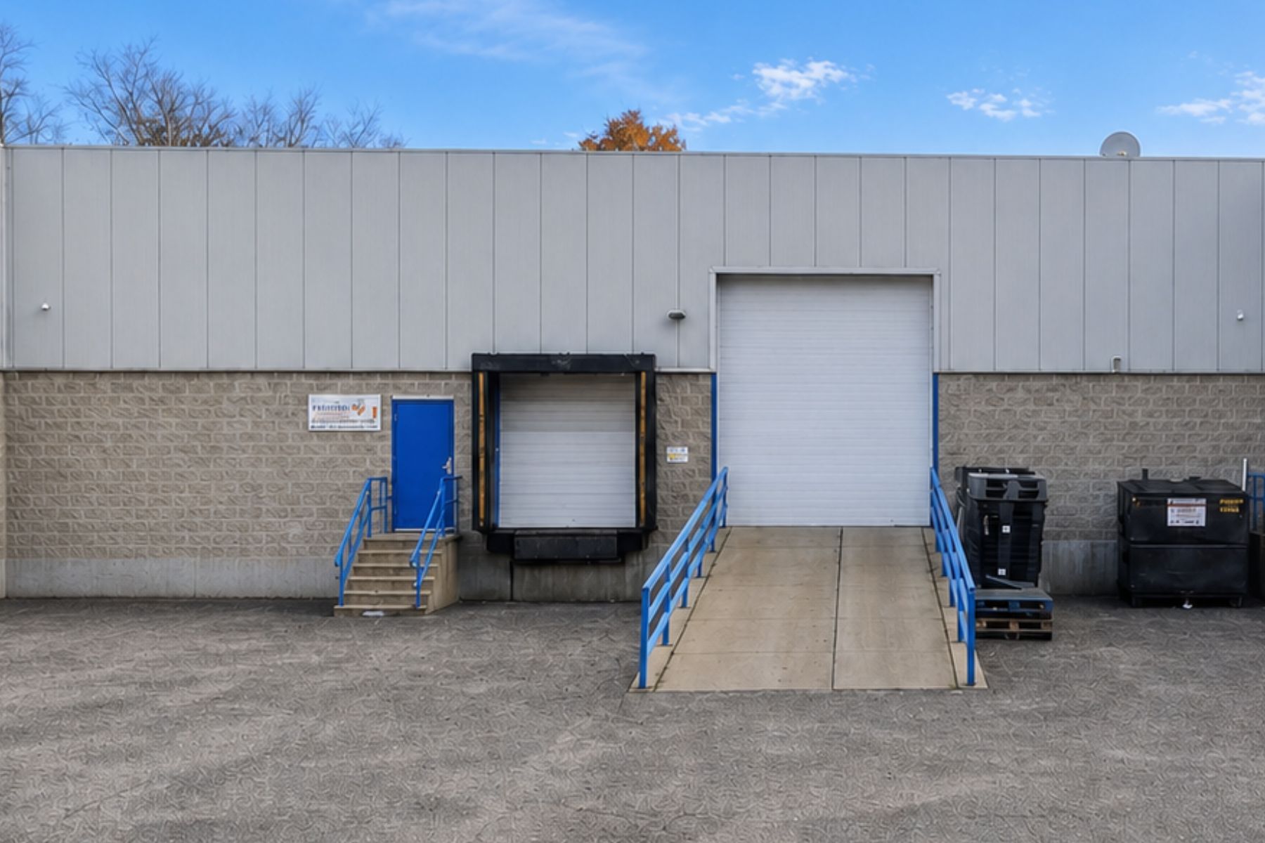 Strategic Freight Access Featuring an 8' W x 10' H Loading Dock and a 12' W x 14' Drive-In Door with a Ramp Strategic Freight Access Featuring an 8' W x 10' H Loading Dock and a 12' W x 14' Drive-In Door with a Ramp